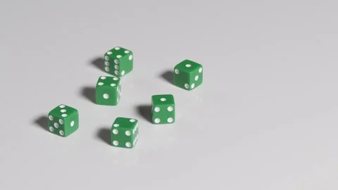 Six green dices rolling in slow motion Stock Footage 161955365
