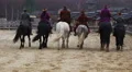 Six knight riders on horseback galloping in old deserted city, slow motion HD Footage
