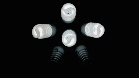 Six light bulbs in the form of a man on a dark background Stock Footage 101869977