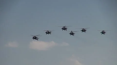 Six Mi-28N combat helicopters of night hunter (Havoc) perform group aerobatics. Stock Footage 135318991