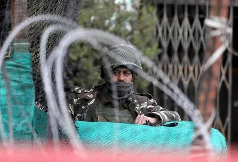 Six militants and AIF Garud commando killed in gun fight in north Kashmir, Srina Stock Photos