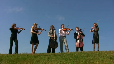 Six musicians plays bow instruments on hill Видео 673528