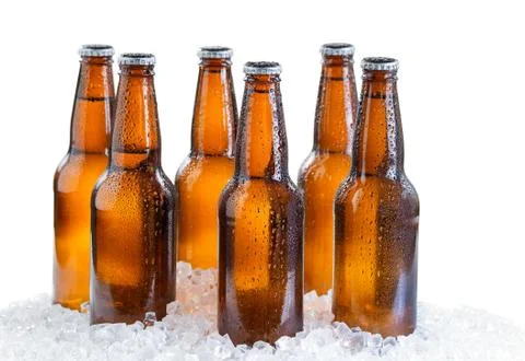 Six pack of ice cold bottled beer isolated on white background Stock Photos