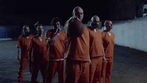 Six prisoners inviting you to play basketball Stock Footage 283084264