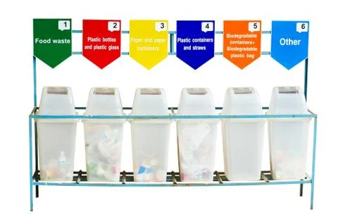 Six trash containers for garbage separation Foto stock