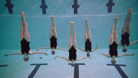Six Women in the pool practicing Synchronized Swimming upside down Stock Footage 283102223