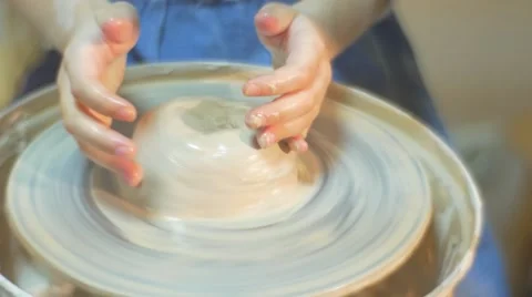 A Six Year Girl and a Master Are Making Some Clay Craft Together at a Moving Stock Footage 59122120