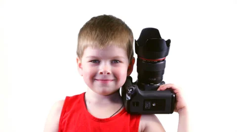 Six year old boy with a camera 스톡 동영상 37204359