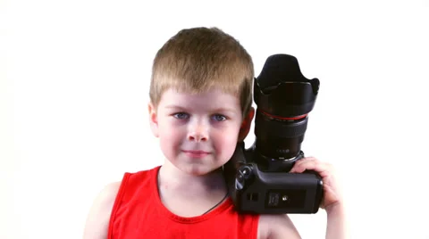 Six year old boy with a camera Stock Footage 37204368
