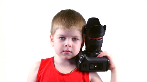 Six year old boy with a camera Stock Footage 37204378