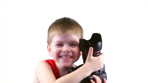 Six year old boy with a camera Stock Footage 37204382