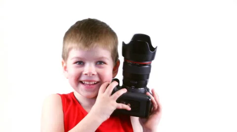 Six year old boy with a camera Stock Footage 37204385
