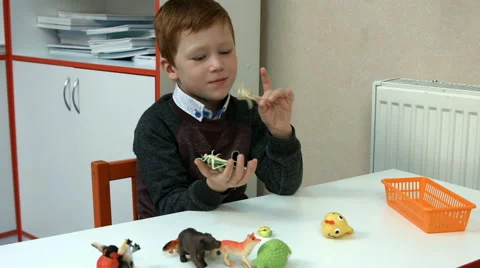 Six-year-old boy in class Stock Footage 65564364