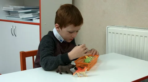 Six-year-old boy in class Stock Footage 65564372