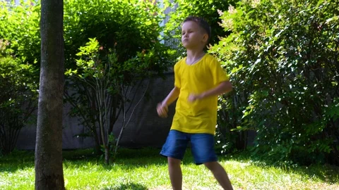 A six-year-old child is dancing. Stock Footage 109569324