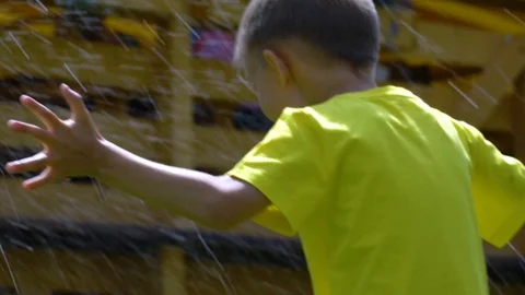 A six-year-old child has wet his head. Stock Footage 109571918