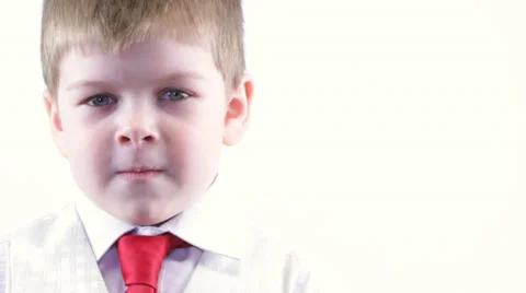 Six years boy  looking at the camera ang smiling 스톡 동영상 37204541