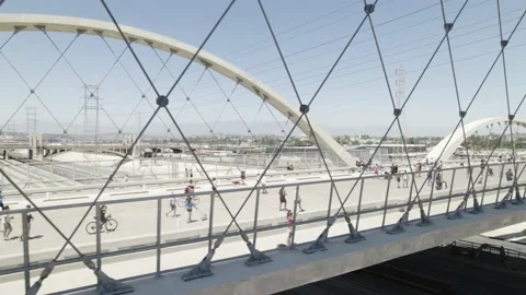Sixth Street Viaduct Arch Cables and Cyclists, 4K Stock Footage 201045588