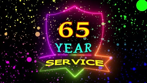 Sixty five year service neon shield motion Stockbeeldmateriaal 330511176