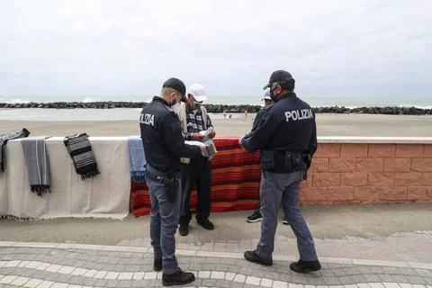 Sixty security volunteers regulate the influx to the free beaches, Rome, Italy - Stock Photos