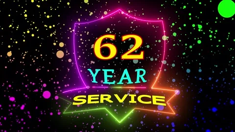 Sixty two year service neon particles motion Video stock 330511161