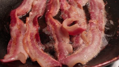 Sizzling bacon Stock Footage 79732748