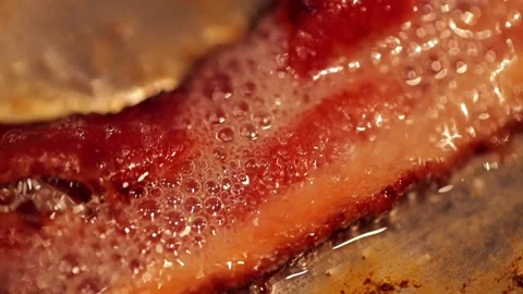 Sizzling Bacon in slow motion Stock Footage 149118654