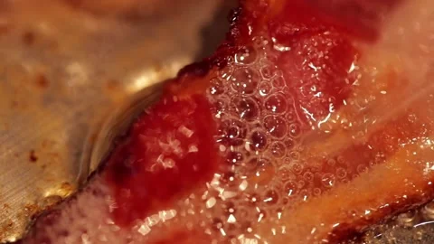 Sizzling Bacon in slow motion Stock Footage 149118656