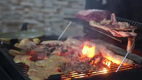 Sizzling BBQ Delight: Hot Grilling Action Stock Footage 258294057