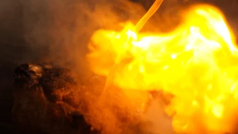 Sizzling BBQ Ribs over an open flame Stock Footage 127433417