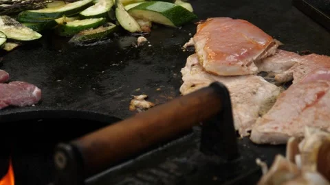Sizzling Cooking Process with Meat and Vegetables Stock Footage 347748601