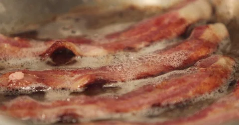 Sizzling, Greasy, Crispy Bacon Stock Footage