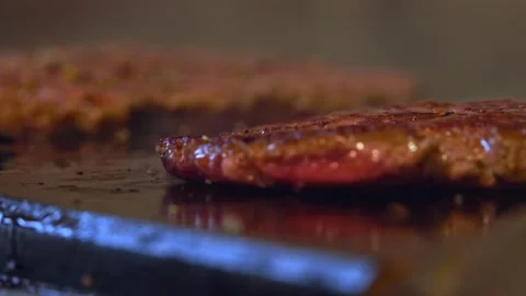 Sizzling Ground Beef: Close-Up of Juicy Hamburger Meat Cooking on the Grill Stock Footage 288692383
