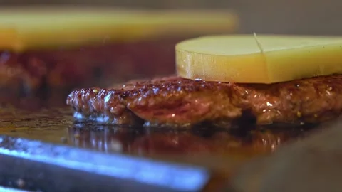 Sizzling Ground Beef: Close-Up of Juicy Hamburger Meat Cooking on the Grill Stock Footage 288692447