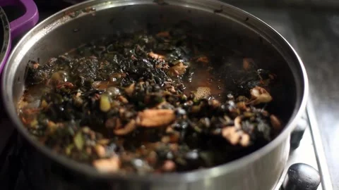 A sizzling pot of vegetable soup Stock Footage 257343156