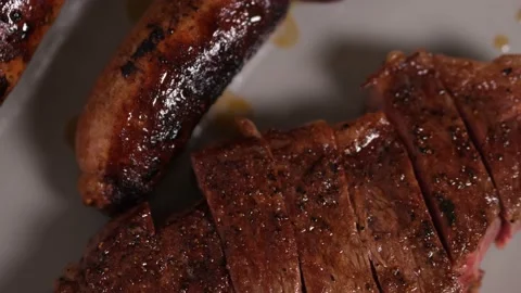 Sizzling Prime Cut T-Bone Steak On Home Cast Iron Skillet 4k 60fps Stock Footage 130912282