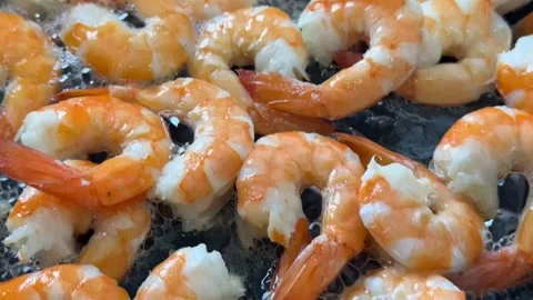 Sizzling Shrimp in Pan Close Up Stock Footage 299908425
