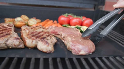 Sizzling Steak on the BBQ Stock Footage 169262919