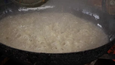 Sizzling StirFry  A Culinary Journey Through the Wok Stock Footage 324016790