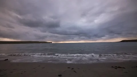Skaill beach in Orkney with lapping waves and dramatic sky in 4k Video stock 288250134