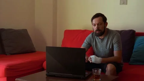 Skared man have video call at home and shows signal for help Stock Footage 166817064