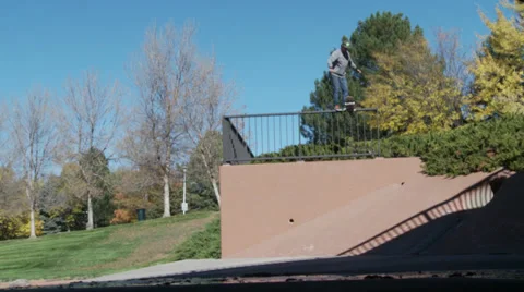 Skateboard Jumps Off Railing Stock Footage 27829965