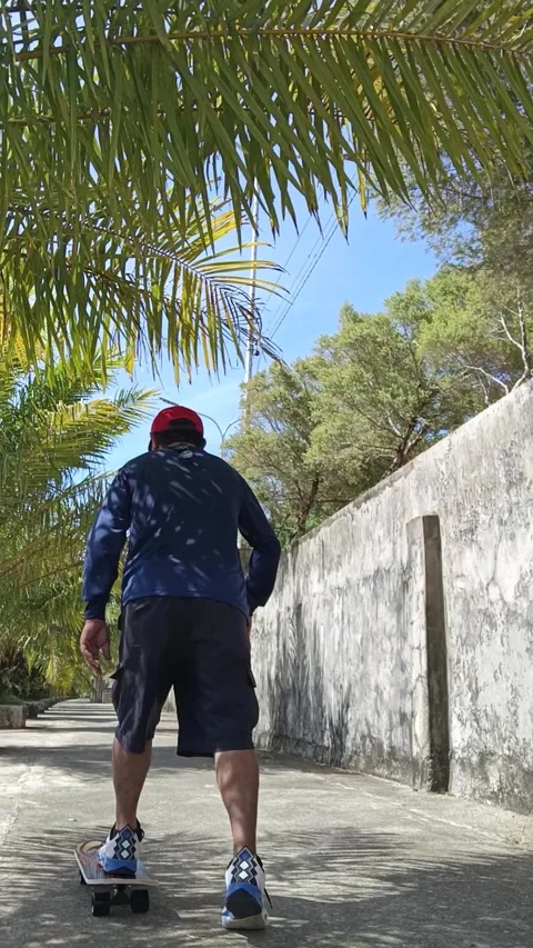 Skateboard Man in a Park just on a Basic Training on Sampaguita Boulevard Stock Footage 336658271