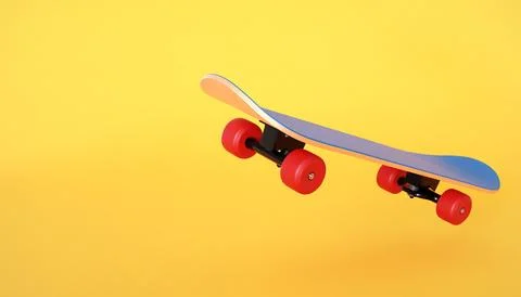 Skateboard on orange background Stock Illustration
