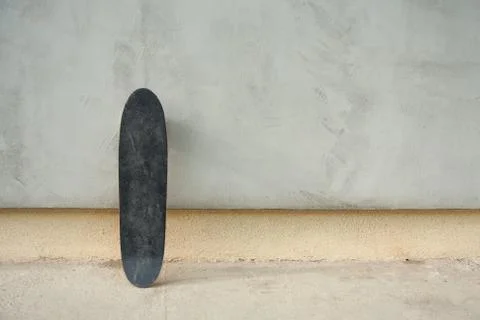 Skateboard on a wall Фото
