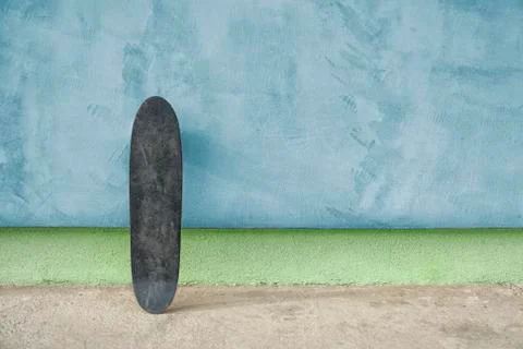 Skateboard on a wall Photos