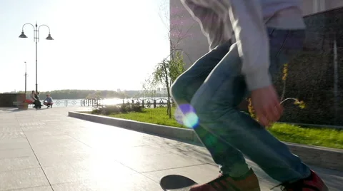 Skateboarder does flip at sunset Stock Footage 64743171