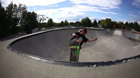 Skateboarder does a line of tricks Stock Footage 63770698