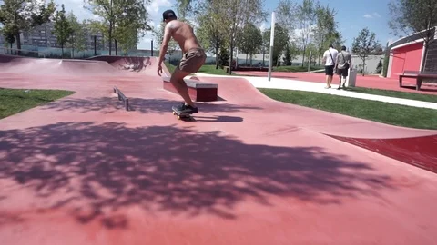 Skateboarder does the trick but eventually falls Video stock 102249737