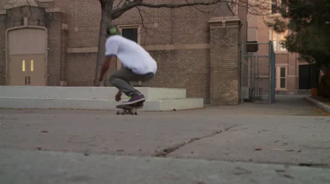 Skateboarder Does Trick on Ledge Stock Footage 27829223